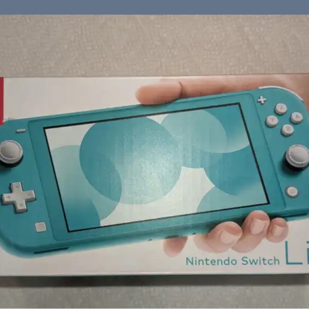 NIB Rare Nintendo Switch Lite Coca Cola edition